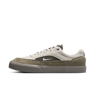 Nike SB Malor Skate Shoes in Light Bone/Light Army— vulcanized skate shoe with suede and canvas upper, extended toe bumper, cushioned collar, and herringbone grip outsole built for entry-level skaters.
