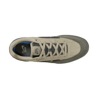 Nike SB Malor Skate Shoes in Light Bone/Light Army— vulcanized skate shoe with suede and canvas upper, extended toe bumper, cushioned collar, and herringbone grip outsole built for entry-level skaters.
