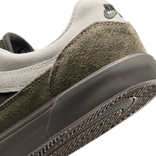 Nike SB Malor Skate Shoes in Light Bone/Light Army— vulcanized skate shoe with suede and canvas upper, extended toe bumper, cushioned collar, and herringbone grip outsole built for entry-level skaters.
