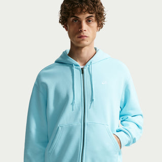 Glacier blue Nike SB full-zip fleece hoodie with embroidered chest logo, roomy fit, and white accents.