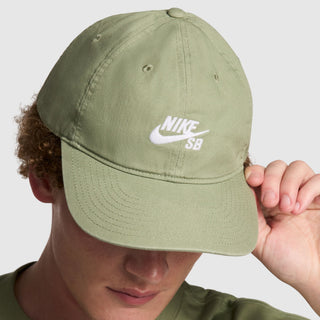 Nike SB Skate Club Cap in Oil Green, cotton twill, six-panel, unstructured, adjustable back, embroidered eyelets.