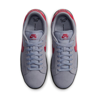 Overhead view of Nike SB Tennis Classic shoes featuring grey laces, red heel tabs and Nike SB tongue branding.