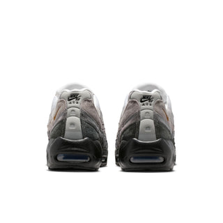Nike Air Max 95 sneakers in Black and Cacao Wow colorway with layered mixed materials and visible Max Air cushioning