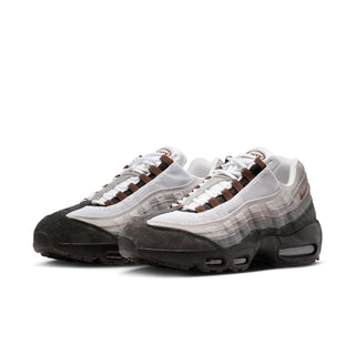 Nike Air Max 95 sneakers in Black and Cacao Wow colorway with layered mixed materials and visible Max Air cushioning