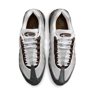 Nike Air Max 95 sneakers in Black and Cacao Wow colorway with layered mixed materials and visible Max Air cushioning