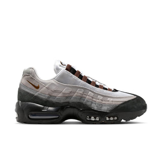 Nike Air Max 95 sneakers in Black and Cacao Wow colorway with layered mixed materials and visible Max Air cushioning