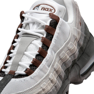 Nike Air Max 95 sneakers in Black and Cacao Wow colorway with layered mixed materials and visible Max Air cushioning