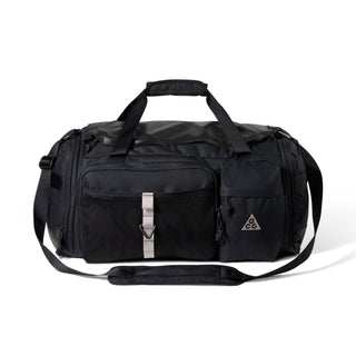 Nike ACG DAYMAX Duffel Bag in Black/College Grey with black carry handles, grey webbing straps, a front zippered pocket, and a small ACG logo