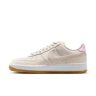Beige sneaker with a white sole on a white background