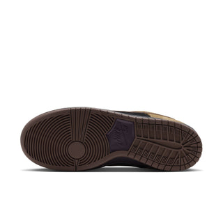 Nike SB Dunk Low Pro Filbert in side view with tan overlays, black panels, a brown Swoosh and laces, and a dark brown sole