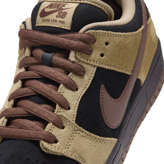 Nike SB Dunk Low Pro Filbert in side view with tan overlays, black panels, a brown Swoosh and laces, and a dark brown sole