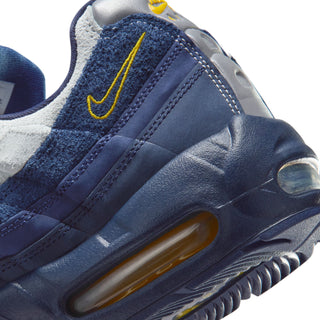 Nike SB Air Max 95 x Eric Koston Obsidian Speed Yellow with leather upper, visible Air cushioning, and signature skate detailing.