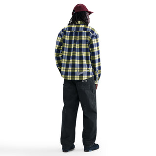 Nike SB x Eric Koston Loose Denim Pants in blue, relaxed fit, durable cotton build, and classic skatewear design.