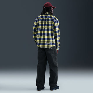 Nike SB x Eric Koston Loose Denim Pants in blue, relaxed fit, durable cotton build, and classic skatewear design.