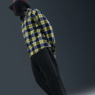 Nike SB x Eric Koston Loose Denim Pants in blue, relaxed fit, durable cotton build, and classic skatewear design.