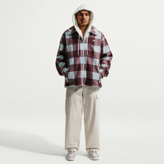 Glacier blue Nike SB skate shirt jacket with burgundy accents, oversized fit, dropped shoulders, and embroidered chest logo.