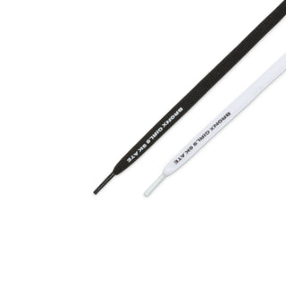 Nike SB Dunk Low Pro Bronx Girls Skate shoes in Black, White, and Challenge Red with textured leather and NYC subway-inspired accents