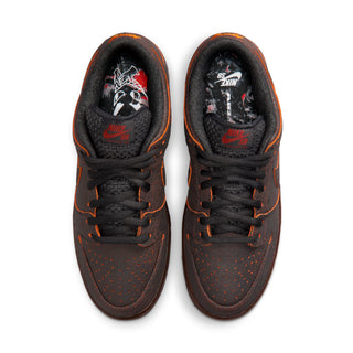 Nike SB Dunk Low Pro Premium Krampus in crackled grey leather with orange underlays.