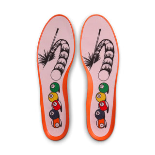 Nike SB Air Max Ishod Premium in university red and black with Max Air cushioning, mesh upper, and flexible cupsole.