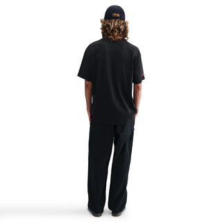 Black Nike SB Krampus skate tee with loose fit and midweight cotton.