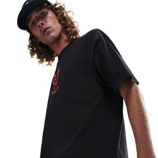 Black Nike SB Krampus skate tee with loose fit and midweight cotton.