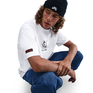 White Nike SB Krampus skate tee with loose fit and midweight cotton.