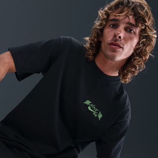 Nike SB Max90 Skate Tee Black with midweight cotton, dropped shoulders, embroidered front logo, and screen-printed back design.
