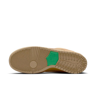 Close-up of a brown shoe sole with a green label on a white background