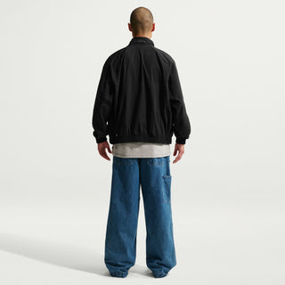 Nike SB Ishod Wair Track Jacket in Black, lightweight nylon blend with two-way zipper and WAIR branding.