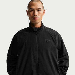 Nike SB Ishod Wair Track Jacket in Black, lightweight nylon blend with two-way zipper and WAIR branding.