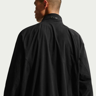 Nike SB Ishod Wair Track Jacket in Black, lightweight nylon blend with two-way zipper and WAIR branding.