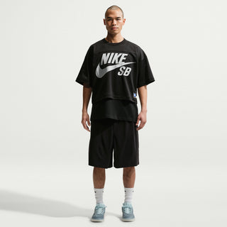 Nike SB Skate Shorts in Black/White — sweat-wicking nylon-spandex blend with roomy skate fit, elastic canvas belt waistband, and hook-and-loop back pockets.


