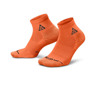 Nike ACG Everyday Elevated Ankle Socks in Safety Orange, Black, and Reflective — shown as a single pair with cushioned heel and mesh top detail