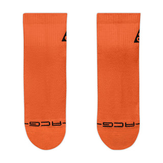 Nike ACG Everyday Elevated Ankle Socks in Safety Orange, Black, and Reflective — shown as a single pair with cushioned heel and mesh top detail