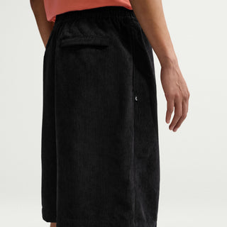 Nike SB Corduroy Skate Shorts in Black/White, midweight corduroy with 5 pockets including zip pocket, elastic drawcord waistband, and Nike SB embroidery and flag label