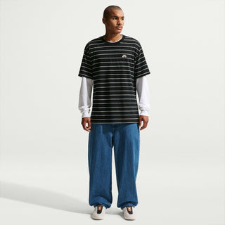 Nike SB Loose Denim Skate Pants in Blue with 100% cotton denim, loose fit through seat and thighs, interior drawcord, belt loops, five pocket silhouette, and Nike SB flag label