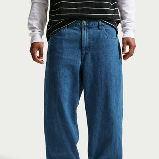 Nike SB Loose Denim Skate Pants in Blue with 100% cotton denim, loose fit through seat and thighs, interior drawcord, belt loops, five pocket silhouette, and Nike SB flag label