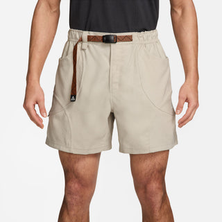 Nike ACG Dolomiti Corduroy Shorts in Lt Orewood Brown/Cinnamon — Dolomite-inspired corduroy with water-repellent finish, elastic waistband with belt, zip and snap closure, embroidered ACG and Swoosh logo