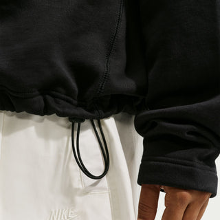 Nike SB Club 58 black half-zip fleece sweatshirt with adjustable hem and relaxed fit.
