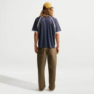 "Nike SB Yuto Horigome Short-Sleeve Skate Jersey — Yuto family crest logo front and center, lightweight moisture-wicking fabric, roomy breathable fit"