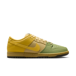 A Nike Dunk Low sneaker in a yellow, beige, and sage green colorway, shown from a side profile view on a white background.