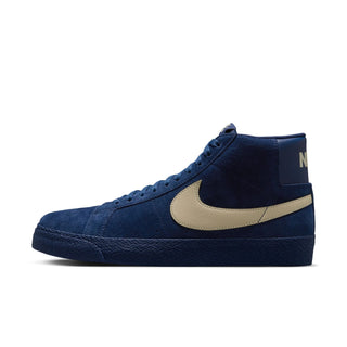 Blue high-top sneaker with beige swoosh logo on a white background