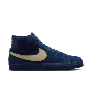 Blue high-top sneaker with beige swoosh logo on a white background