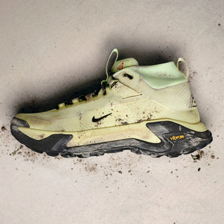 Nike ACG Zegama Hike Men's Hiking Shoes in Life Lime/DK Smoke Grey-Barely Volt — ZoomX foam midsole, Vibram® MegaGrip Traction Lug outsole, breathable textile upper, and heel strap for all-conditions trail performance.
