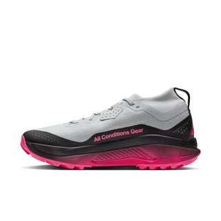 Nike ACG Zegama Trail GORE-TEX in Pure Platinum/Wolf Grey/Hyper Pink with grey laces, dark overlays, pink accents, and ACG insole branding.