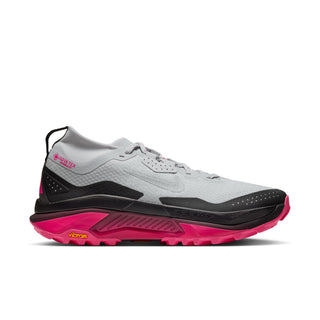 Nike ACG Zegama Trail GORE-TEX in Pure Platinum/Wolf Grey/Hyper Pink with grey laces, dark overlays, pink accents, and ACG insole branding.