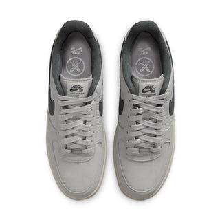 A pair of Nike Air Force 1 Low sneakers in light gray and dark gray, shown from a top-down view on a white background.