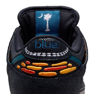 Nike SB x Bluetile Dunk Low Pro with butterfly graphics, suede overlays, and custom Swoosh detailing.