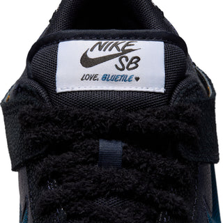 Nike SB x Bluetile Dunk Low Pro with butterfly graphics, suede overlays, and custom Swoosh detailing.