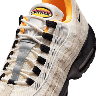Close-up of a sneaker with 'dimax' branding on a white background